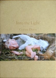 cover of Into the Light by Corina Duyn, A book in a wooden box. Corina Duyn's book shop